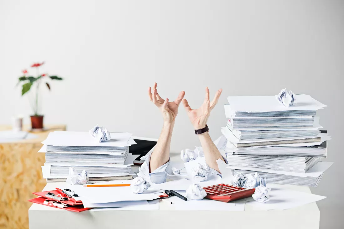 conceptual-image-collage-about-many-crumpled-papers-desk-stressed-male-workplace