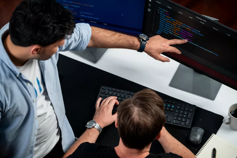 it-developers-discussing-online-software-development-information-sellable