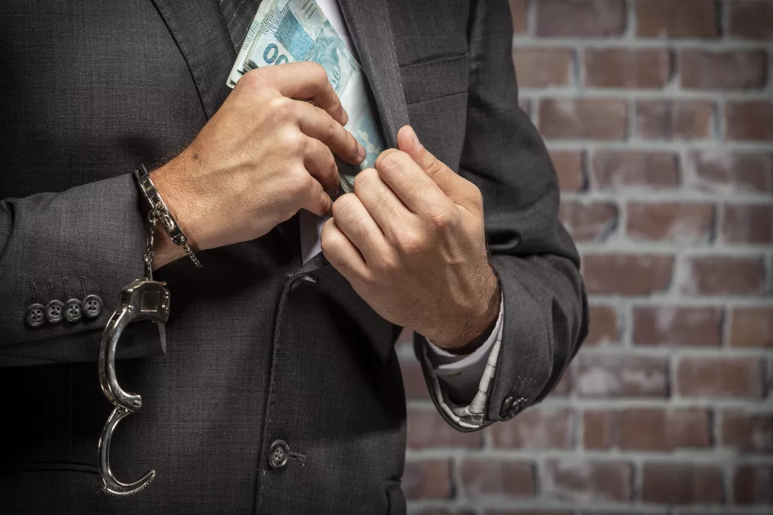 midsection-man-wearing-mask-against-wall